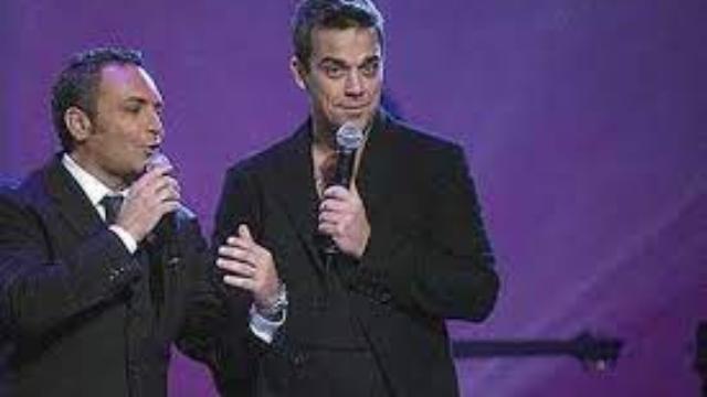 Lucho Jara y Robbie Williams en "Mucho Lucho"