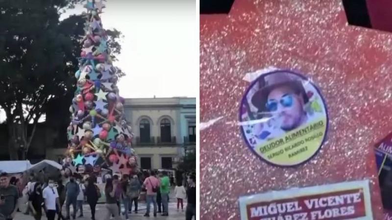 Adornan árbol de Navidad con fotos de padres deudores de alimentos