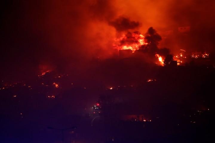 Incendio forestal en la Región de Valparaíso. Créditos: Javier Torres/AFP
