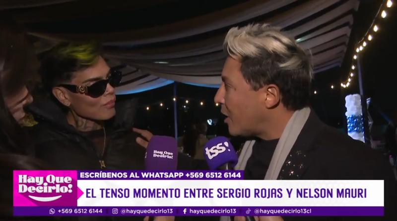 Sergio Rojas y Nelson Mauri viven tenso cruce en evento.
