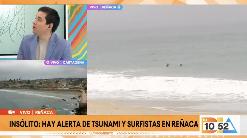 Surfistas llegan a Reñaca pese a alerta de tsunami.