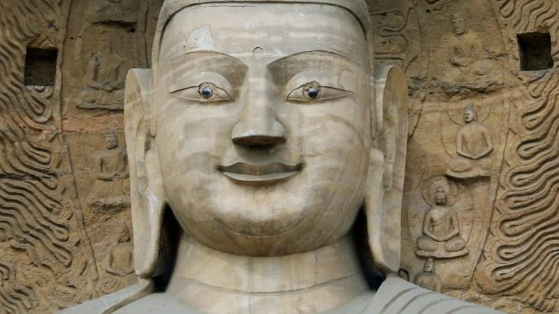 Figura de Buda en Grutas de Yungang, China. Créditos: 13C.