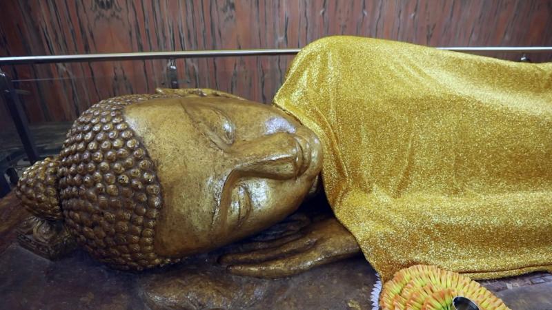 Figura que representa la muerte de Buda. Créditos: 13C.