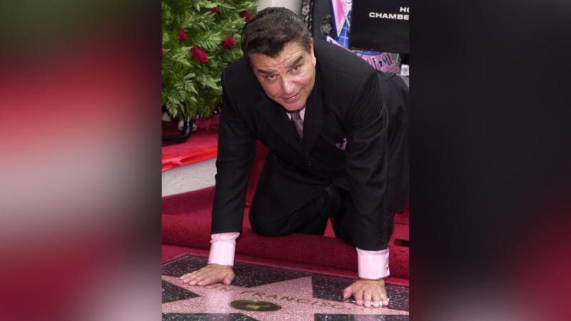 Mario Kreutzberger (Don Francisco) y la estrella del Paseo de la Fama | AFP (Archivo)
