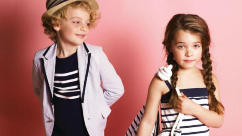 Niños comentando la semana de la moda