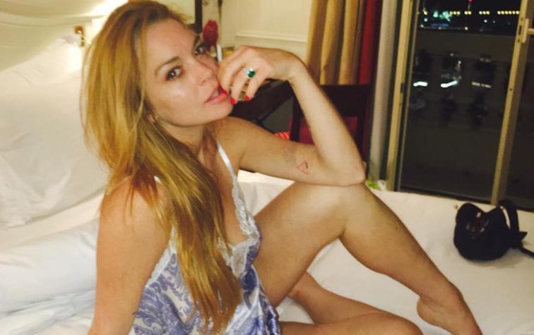 Captan a Lindsay Lohan al sol con nuevo amor