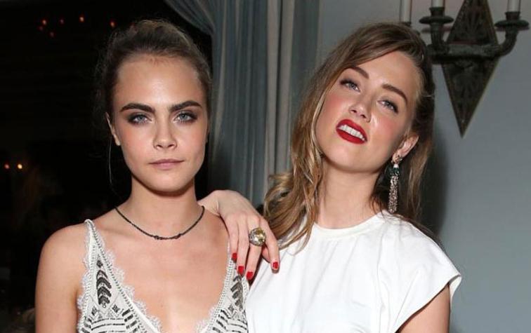 Foto enciende rumores de romance entre Cara Delevingne y Amber Heard