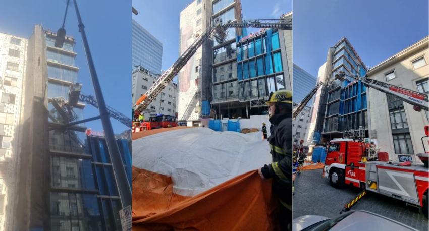 Trabajadores viven minutos de terror al quedar colgando desde un andamio en edificio del centro de Santiago