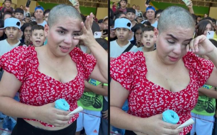 Mujer rompe en llanto por no ganar un iPhone 15 después de raparse 