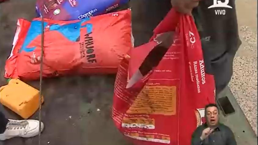Grupo de amigos viajó desde Paine para repartir alimento de mascotas en Villa Independencia