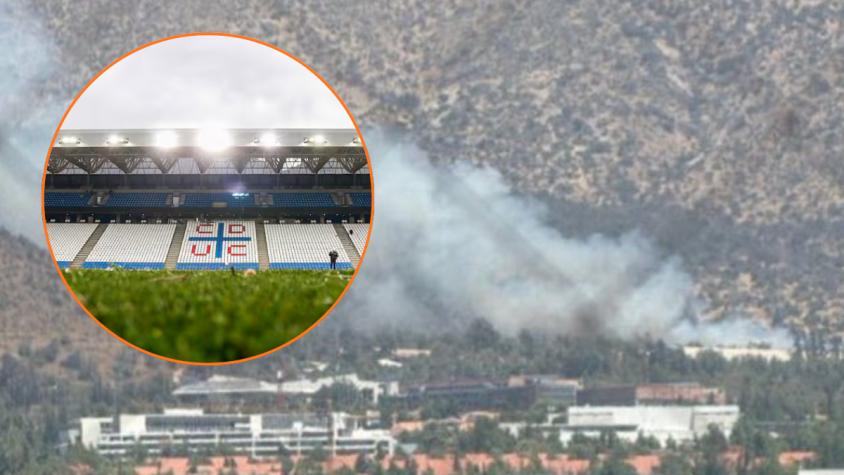 Bomberos combaten incendio forestal en San Carlos de Apoquindo: el fuego se produce cerca del Claro Arena